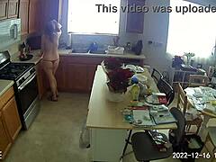Mature clients watch as Lia1616 cleans kitchen in red bikini