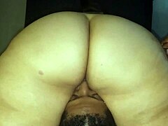 A black man enjoys a wet Latina MILF's face-fucking