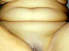 Amateur Indian milf with big boobs gives an intense oral sex session